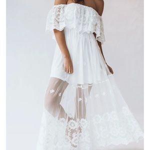 Beautiful white lace strapless dress.